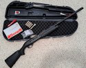 Benelli M2 with case & chokes.jpg